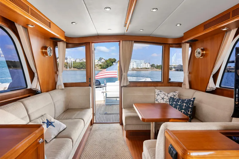 Whole Life Yacht Photos Pics Luxurious interior of 2011 Grand Banks 46 Eastbay SX yacht with elegant wood finish.