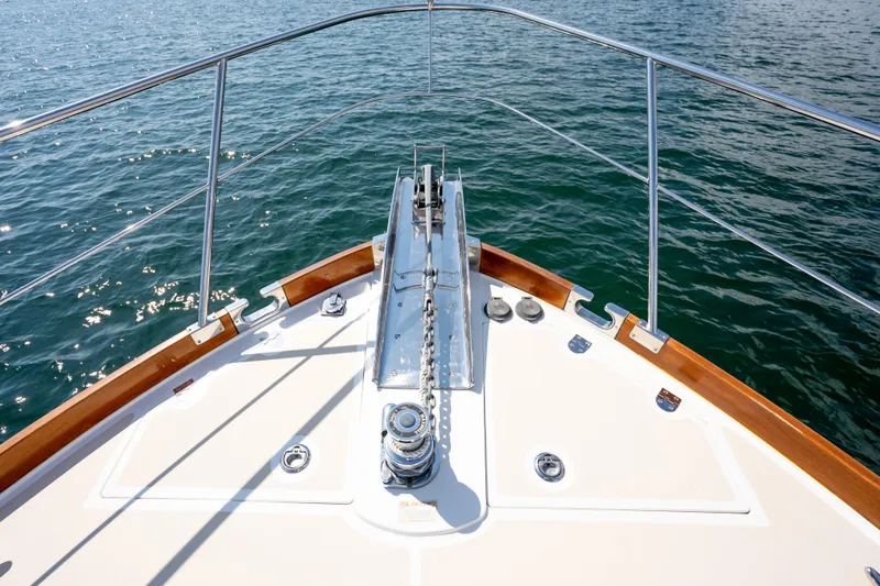 Whole Life Yacht Photos Pics Bow view of 2011 Grand Banks 46 Eastbay SX yacht on water.