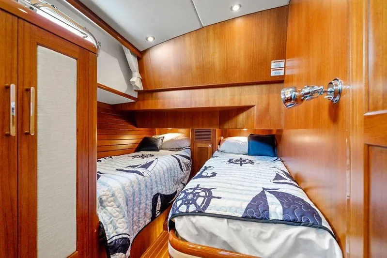 Whole Life Yacht Photos Pics Luxurious 2011 Grand Banks 46 Eastbay SX cabin with twin beds and nautical decor.