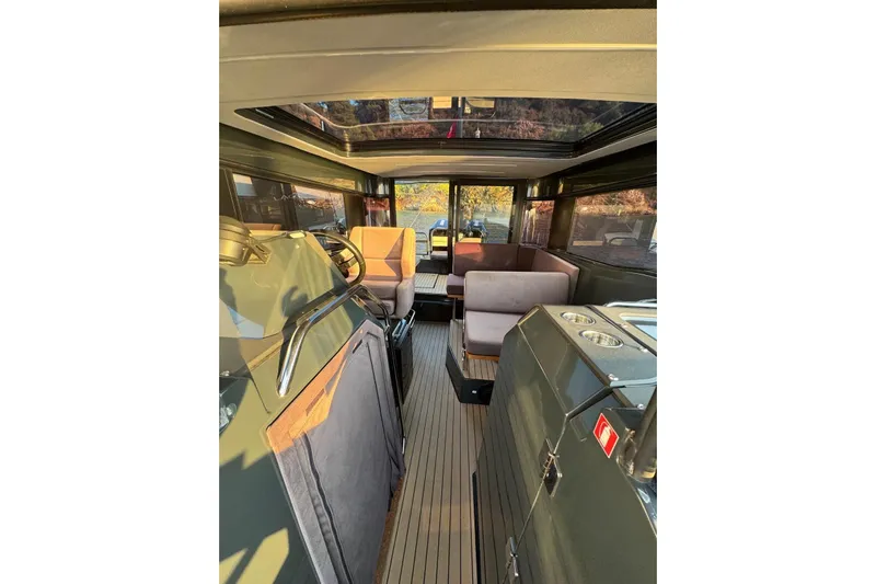  Yacht Photos Pics Interior of 2021 XO EXPLORER 10S boat with modern seating and sleek design.