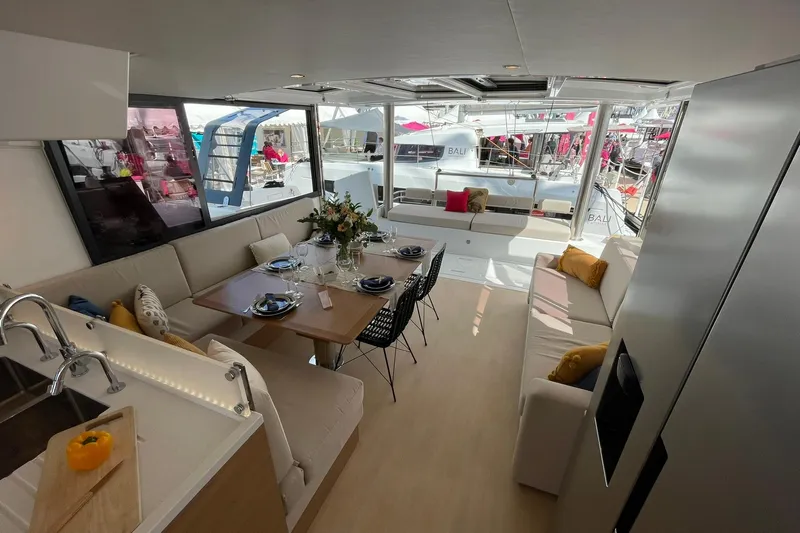 Azure Yacht Photos Pics Luxurious interior of 2025 Bali 4.8 yacht with elegant dining area and modern design.