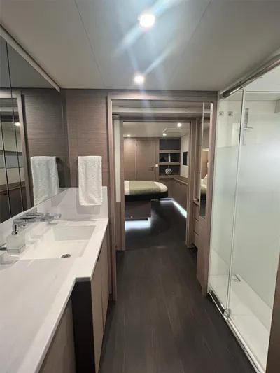 Tbd Yacht Photos Pics Luxurious interior of 2022 Fountaine Pajot Samana 59 yacht with modern bathroom and bedroom.