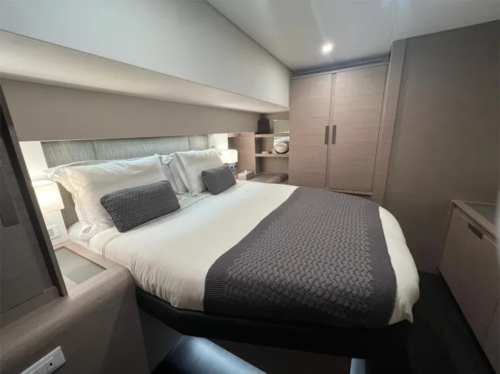 Tbd Yacht Photos Pics Luxurious bedroom interior of 2022 Fountaine Pajot Samana 59 yacht with modern design.