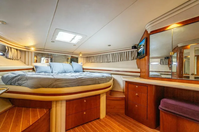Southern Seas Yacht Photos Pics Luxurious cabin interior of 1999 Sea Ray 56 Sedan Bridge yacht with wood accents.