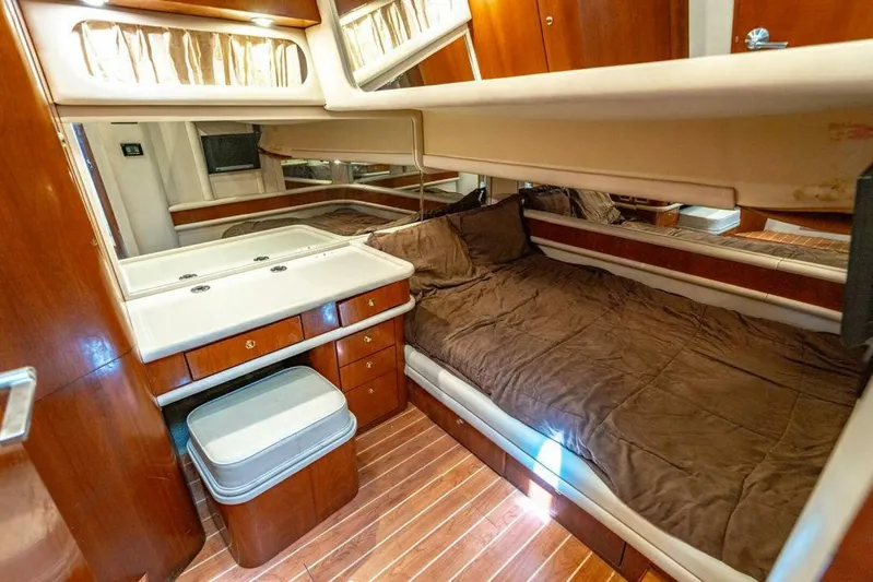 Southern Seas Yacht Photos Pics Luxurious cabin interior of 1999 Sea Ray 56 Sedan Bridge yacht with wood finish.