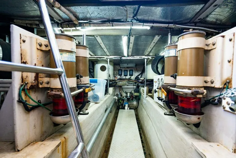 Southern Seas Yacht Photos Pics Engine room of 1999 Sea Ray 56 Sedan Bridge yacht, showcasing mechanical components and equipment.