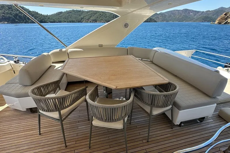  Yacht Photos Pics Luxurious Azimut 70 yacht deck with elegant seating and ocean view, 2010 model.