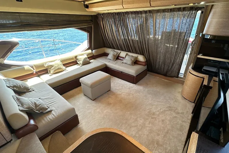  Yacht Photos Pics Luxurious interior of a 2010 Azimut 70 yacht with elegant seating and ocean view.