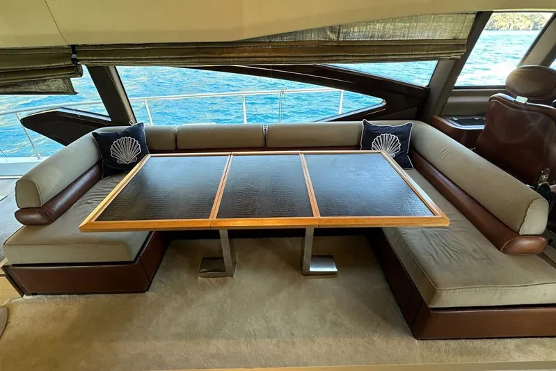  Yacht Photos Pics Luxurious interior of a 2010 Azimut 70 yacht with elegant seating and table.