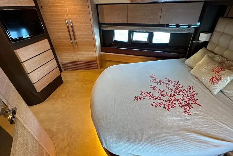  Yacht Photos Pics Luxurious bedroom interior of 2010 Azimut 70 yacht with elegant bedding and modern design.