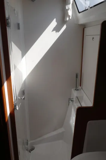  Yacht Photos Pics Interior of 2014 Beneteau Oceanis 41 sailboat, featuring a sleek, modern bathroom design.