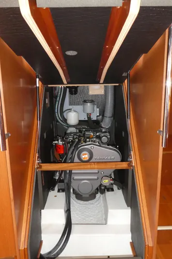  Yacht Photos Pics 2014 Beneteau Oceanis 41 engine compartment with Yanmar engine, showcasing clean and organized layout.