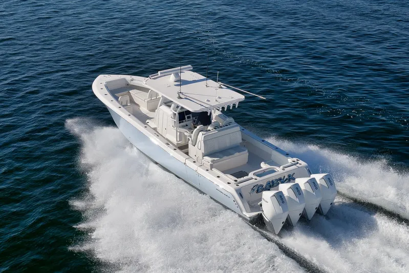  Yacht Photos Pics 2022 Invincible 39 Open Fisherman boat cruising on open water.