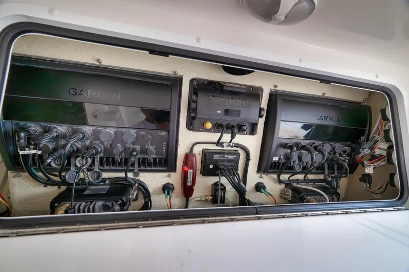  Yacht Photos Pics 2022 Invincible 39 Open Fisherman electronics panel with Garmin and Simrad systems.