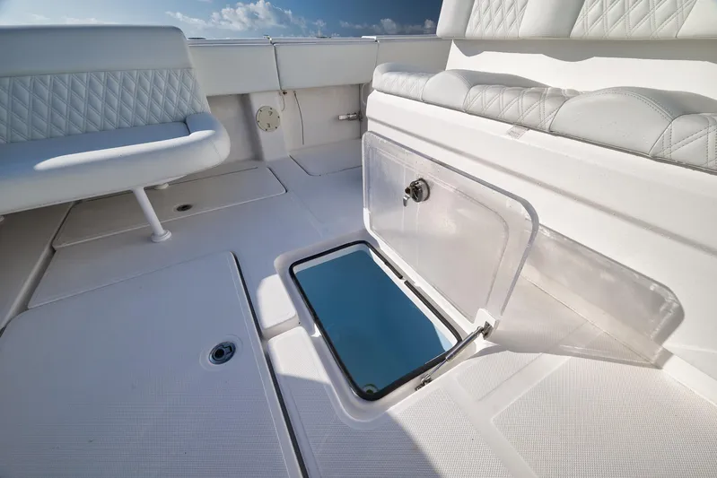  Yacht Photos Pics 2022 Invincible 39 Open Fisherman boat interior with open storage compartment.
