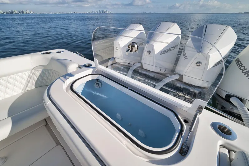  Yacht Photos Pics 2022 Invincible 39 Open Fisherman boat with Mercury engines on open water.