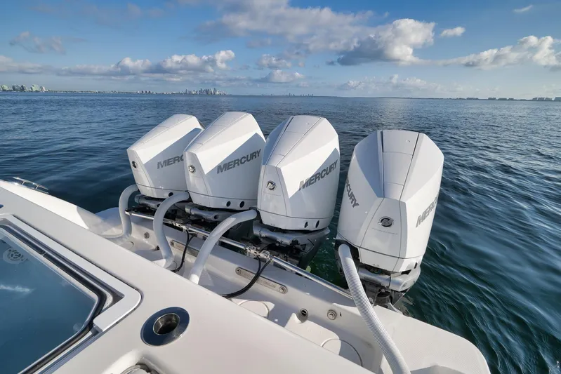  Yacht Photos Pics 2022 Invincible 39 Open Fisherman with four Mercury outboard engines on open water.