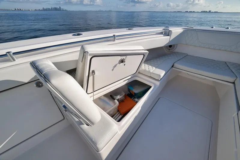  Yacht Photos Pics 2022 Invincible 39 Open Fisherman boat interior with storage compartment open.