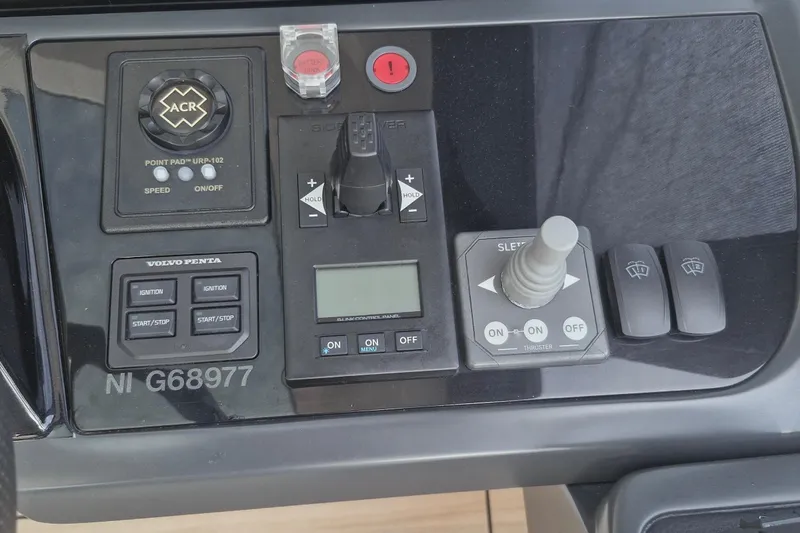  Yacht Photos Pics Control panel of 2024 Princess V50 yacht with joystick and ignition buttons.