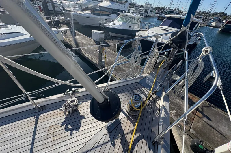 Tenacious Yacht Photos Pics 1987 Mikelson 50 yacht deck with ropes and winch at marina.
