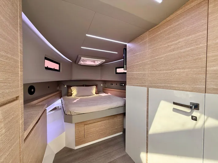  Yacht Photos Pics 2023 Astondoa 377 Coupe Outboard cabin interior with modern design and cozy bed.