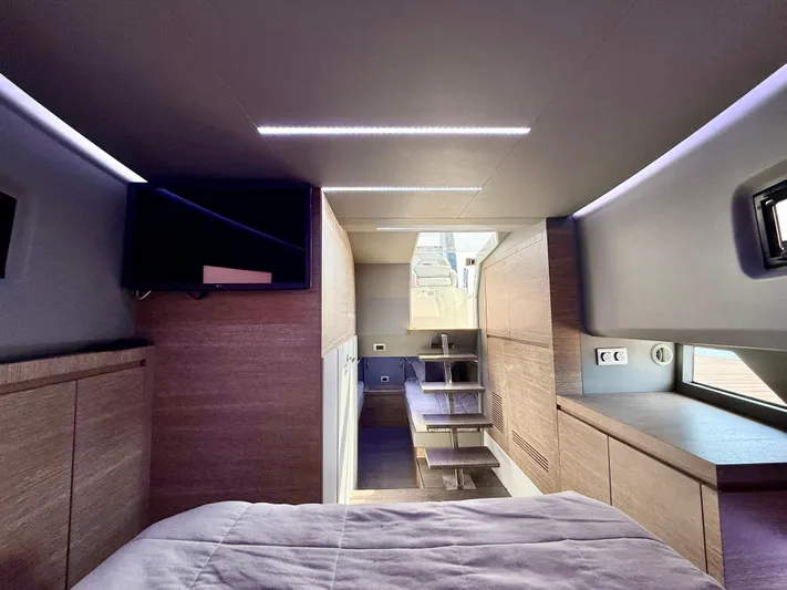  Yacht Photos Pics Luxurious interior of 2023 Astondoa 377 Coupe Outboard yacht with modern wood finishes.