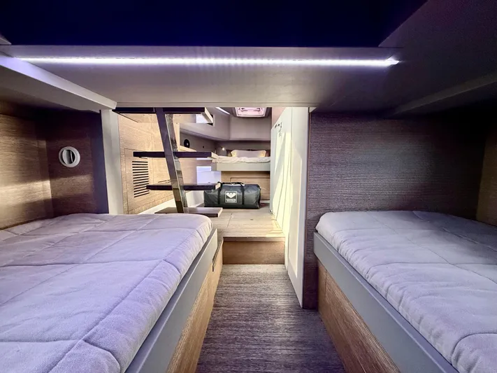  Yacht Photos Pics Interior of 2023 Astondoa 377 Coupe Outboard, featuring cozy twin beds and modern design.