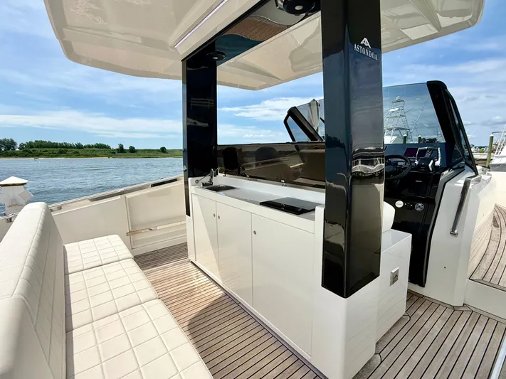  Yacht Photos Pics 2023 Astondoa 377 Coupe Outboard yacht interior with sleek design and modern amenities.