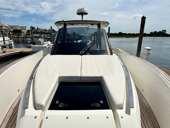  Yacht Photos Pics 2023 Astondoa 377 Coupe Outboard yacht docked at marina, showcasing sleek design and luxury features.