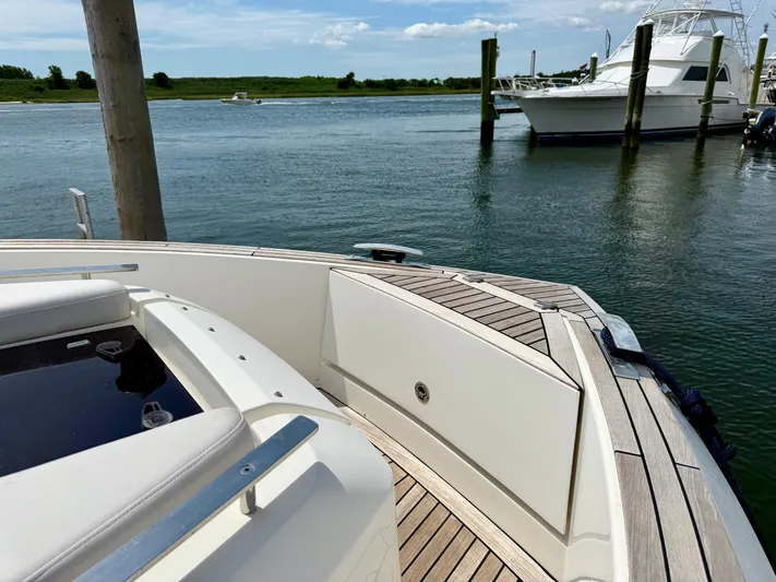  Yacht Photos Pics 2023 Astondoa 377 Coupe Outboard docked, showcasing sleek design and luxurious deck.