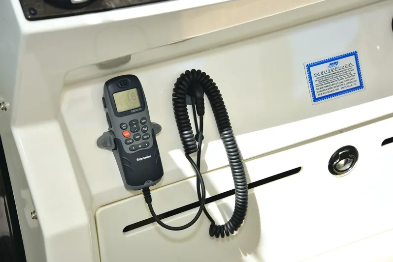Cay IV Yacht Photos Pics VHF radio on 2013 Sea Ray 410 Sundancer boat dashboard.