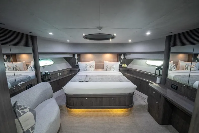 The Matrix Yacht Photos Pics Luxurious bedroom interior of 2007 Sunseeker 82 Yacht with modern design and ambient lighting.