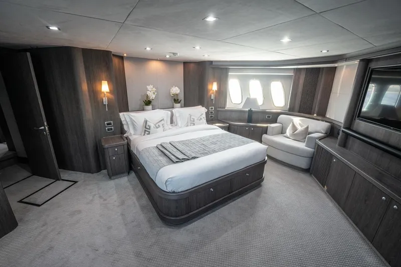The Matrix Yacht Photos Pics Luxurious bedroom interior of 2007 Sunseeker 82 Yacht with modern design and elegant furnishings.