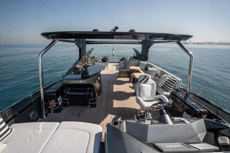 The Matrix Yacht Photos Pics Luxurious 2007 Sunseeker 82 Yacht deck with elegant seating and ocean view.