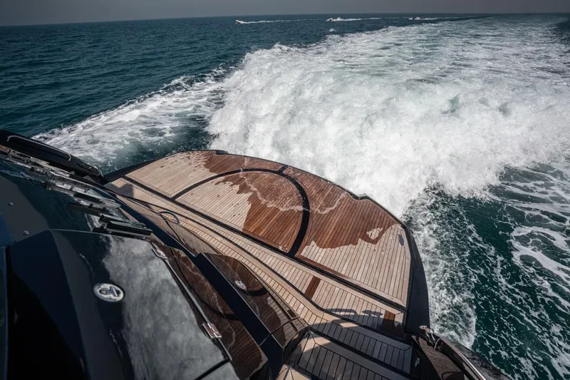 The Matrix Yacht Photos Pics Sunseeker 82 Yacht 2007 cruising on open sea, leaving a foamy wake.