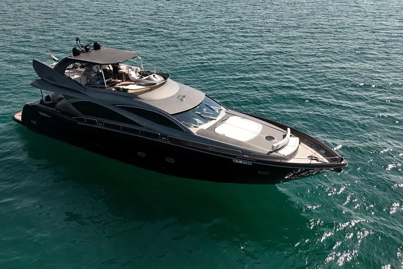 The Matrix Yacht Photos Pics Luxurious 2007 Sunseeker 82 Yacht cruising on clear blue waters.