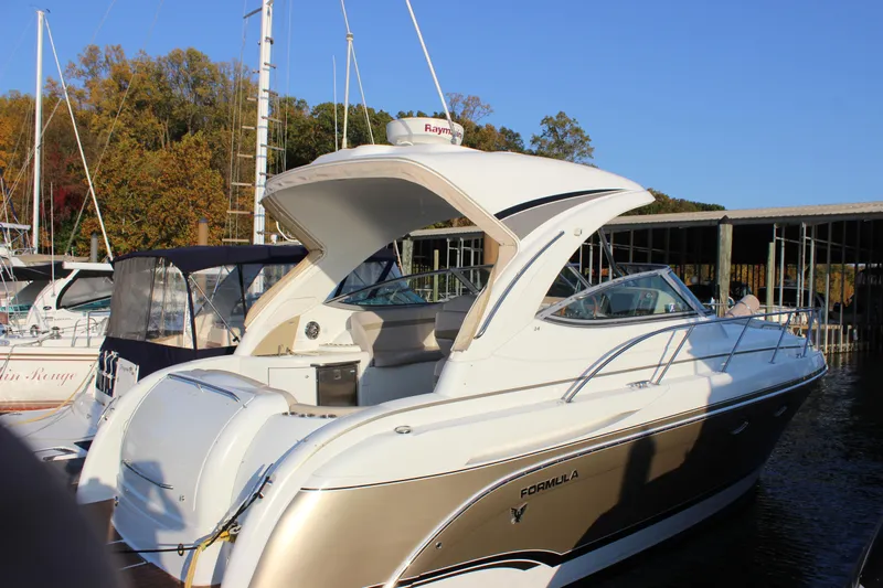  Yacht Photos Pics 2008 Formula 34 Cruiser boat docked at marina, surrounded by other vessels.