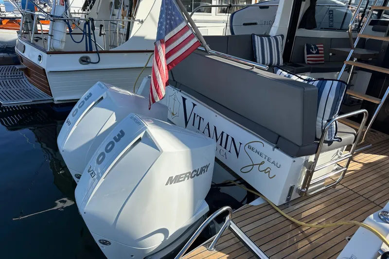 Vitamin Sea Yacht Photos Pics 2023 Beneteau Antares 11 Fly with twin Mercury 300 engines docked at marina.
