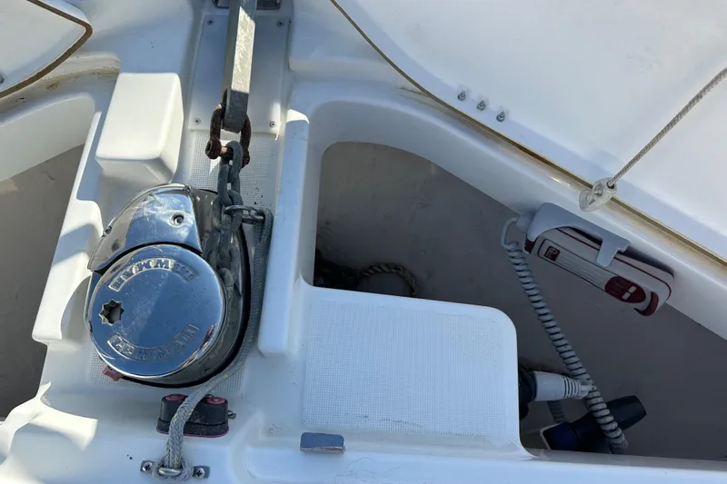 Vitamin Sea Yacht Photos Pics Anchor winch and storage compartment on 2023 Beneteau Antares 11 Fly boat.