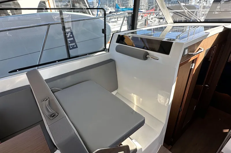 Vitamin Sea Yacht Photos Pics Interior of 2023 Beneteau Antares 11 Fly, featuring modern seating and sleek design.
