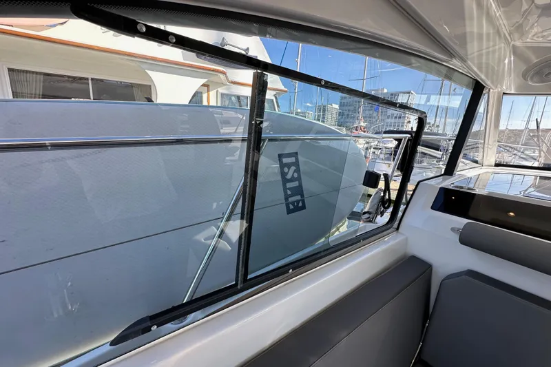Vitamin Sea Yacht Photos Pics Interior view of 2023 Beneteau Antares 11 Fly, showcasing sleek window design.