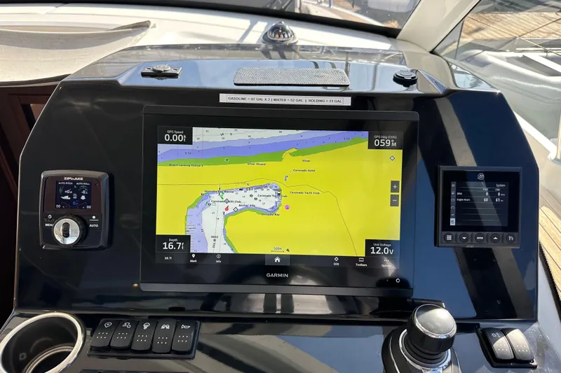 Vitamin Sea Yacht Photos Pics Beneteau Antares 11 Fly 2023 dashboard with navigation display and controls.