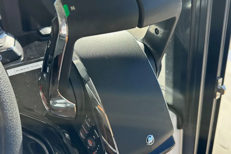 Vitamin Sea Yacht Photos Pics Close-up of throttle controls on 2023 Beneteau Antares 11 Fly boat.