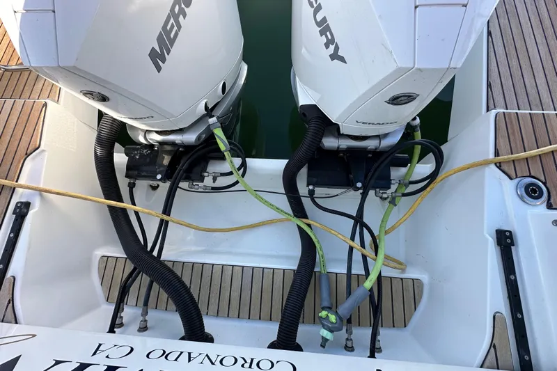 Vitamin Sea Yacht Photos Pics 2023 Beneteau Antares 11 Fly with dual Mercury outboard engines, docked in Coronado, CA.