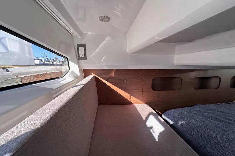 Vitamin Sea Yacht Photos Pics Interior of 2023 Beneteau Antares 11 Fly, featuring cozy seating and modern design.