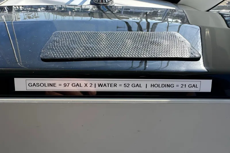 Vitamin Sea Yacht Photos Pics 2023 Beneteau Antares 11 Fly fuel and water capacity label on deck.