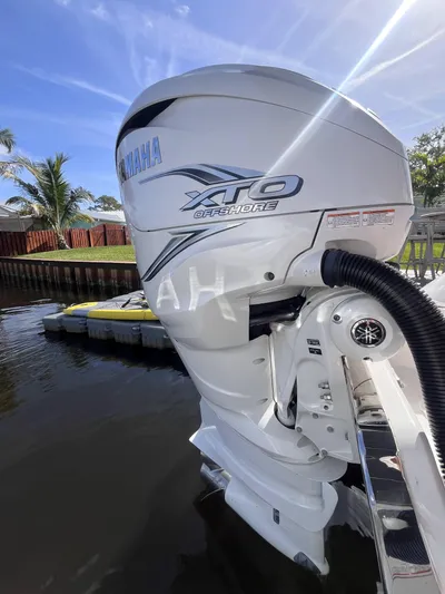  Yacht Photos Pics 2021 Sea Fox 368 Commander with Yamaha XTO outboard motor, docked by a canal.