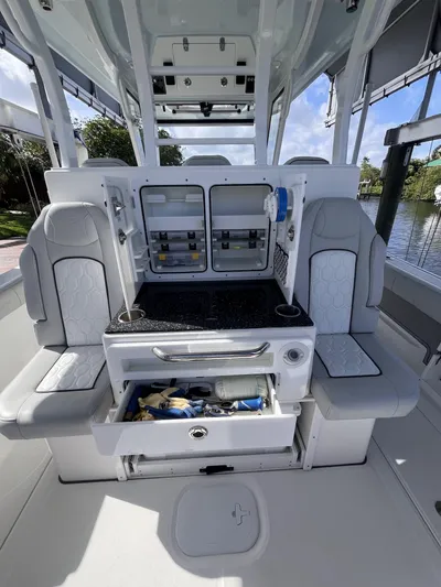  Yacht Photos Pics 2021 Sea Fox 368 Commander boat interior with seating and storage compartments.