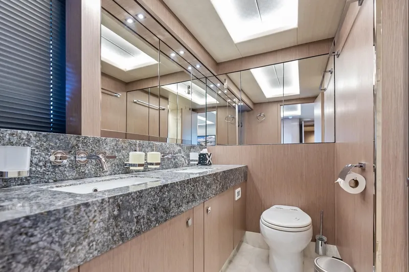 Aqua Vista Yacht Photos Pics Luxurious bathroom in 2019 Sunseeker 86 Yacht with granite countertop and modern fixtures.