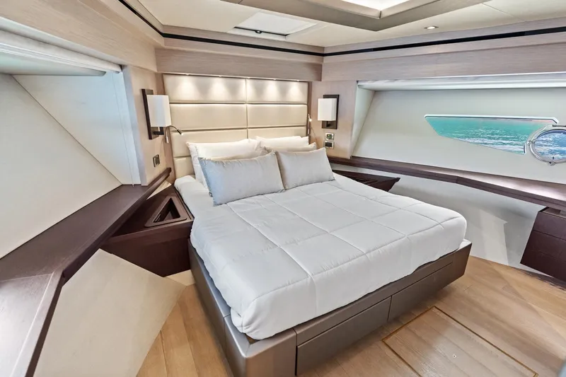 Aqua Vista Yacht Photos Pics Luxurious bedroom interior of 2019 Sunseeker 86 Yacht with elegant design and ocean view.